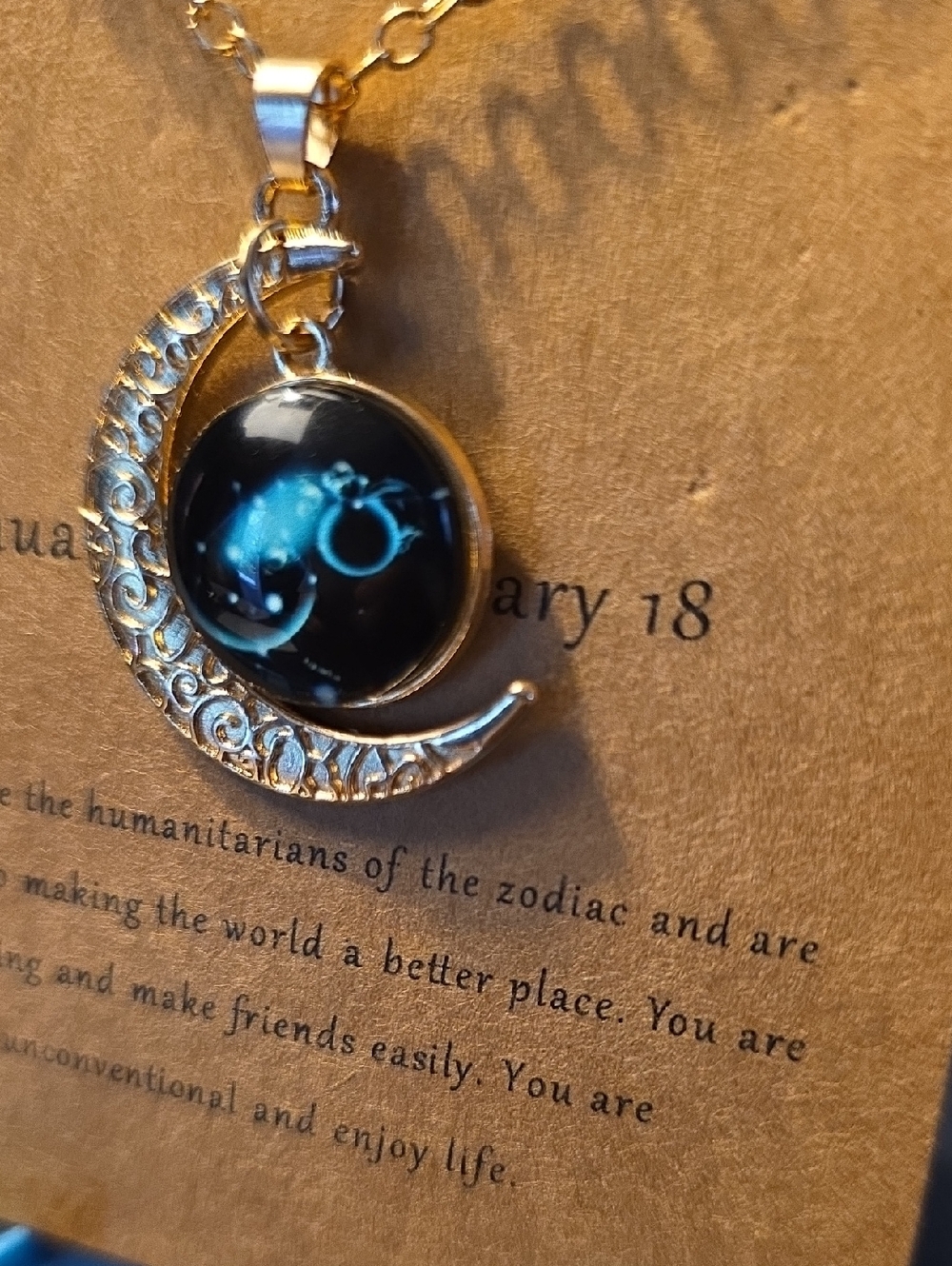 Aquarius Gold-Tone Crescent Moon Necklace with Black Zodiac Pendant - Picture 4 of 9